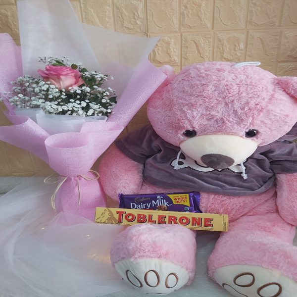 bear, flower bouquet and chocolates
